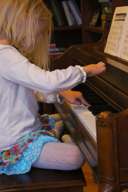 a girl and her piano